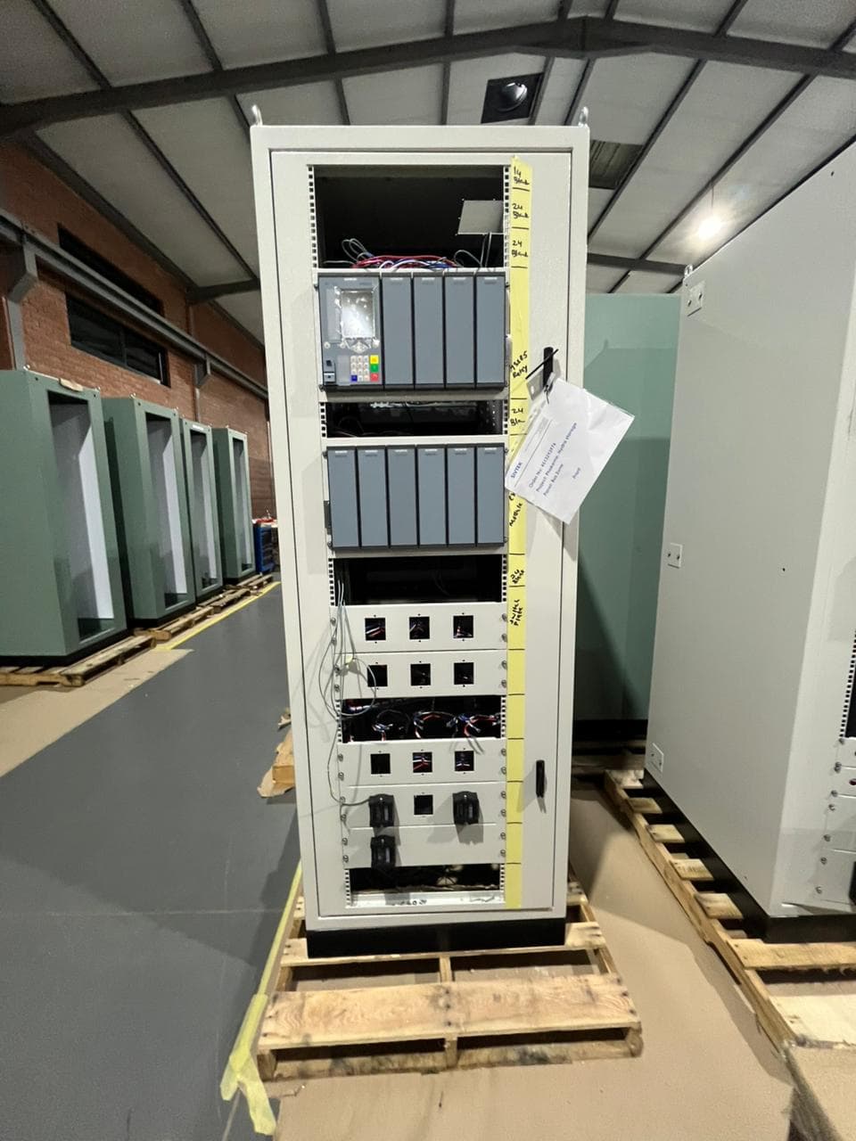 Control panels lined up in the Ivevane workshop, tagged and awaiting despatch.