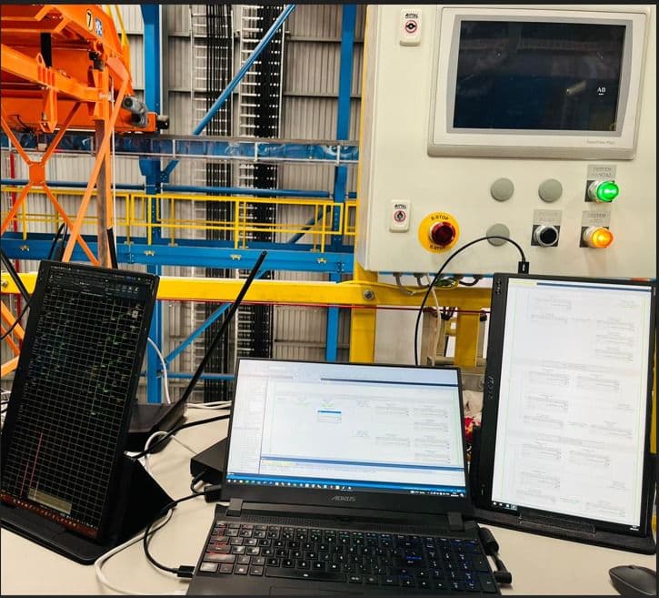 Robot cell integration with an Allen-Bradley PanelView station.