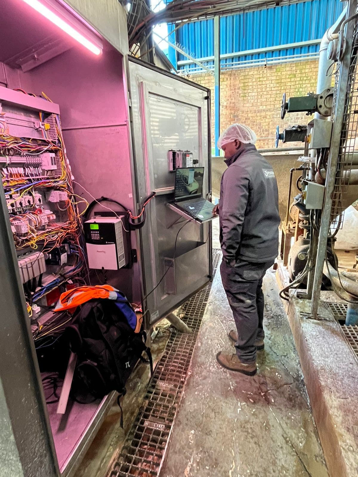 Support call in progress at a PowerFlex drive panel in a food plant.