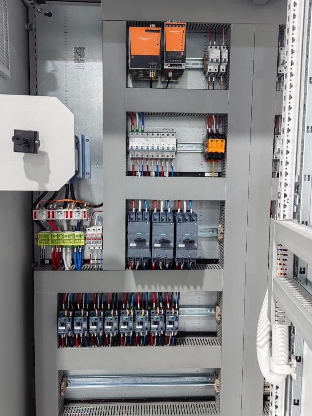 New stainless steel control panel with circuit breakers, power supplies and terminals